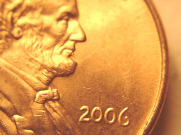 2006-P--LMC-Die-Break/Chip-Under-Lip-Of--Lincoln?
